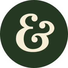 Stylized ampersand on a dark green background.