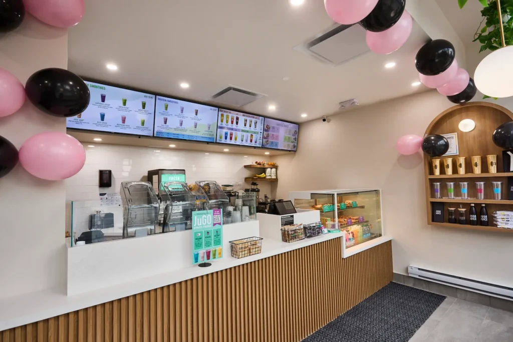 Jugo Juice storefront showing franchise branding and consistent design across locations.